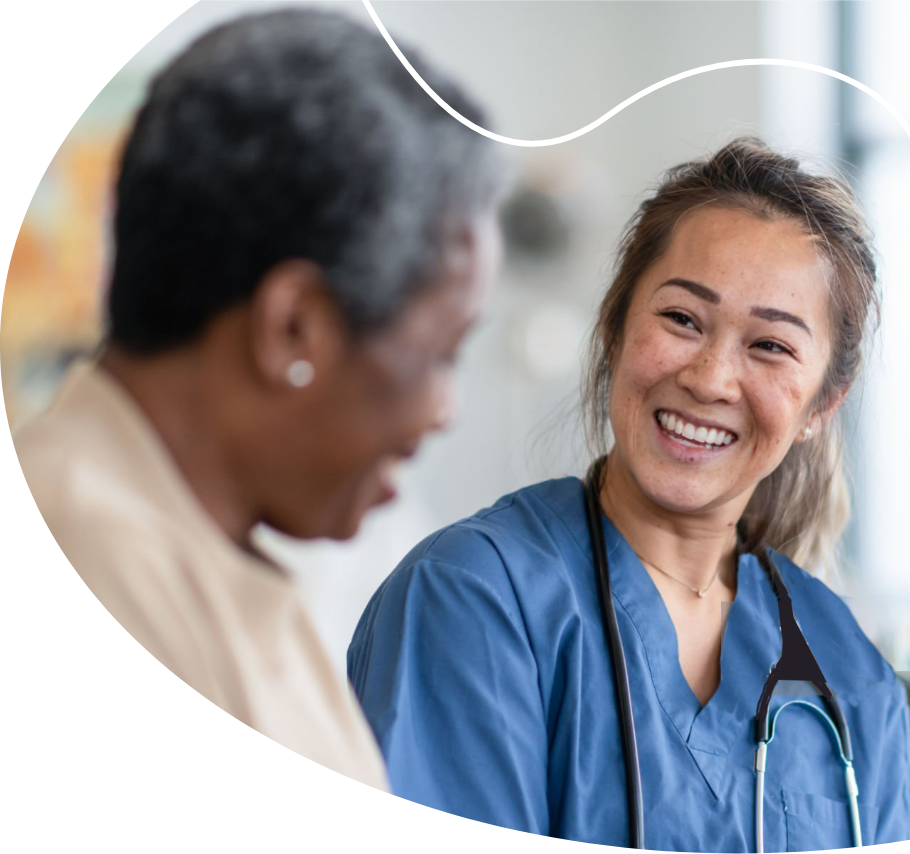 A female doctor smiling at her patient