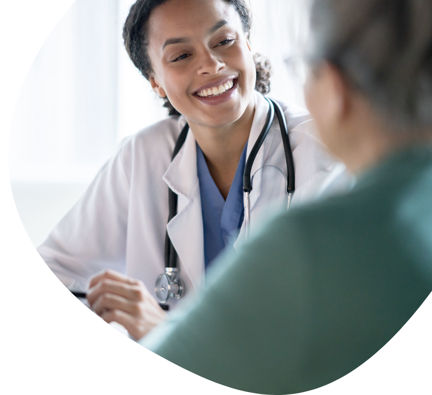 A female doctor smiling at her patient