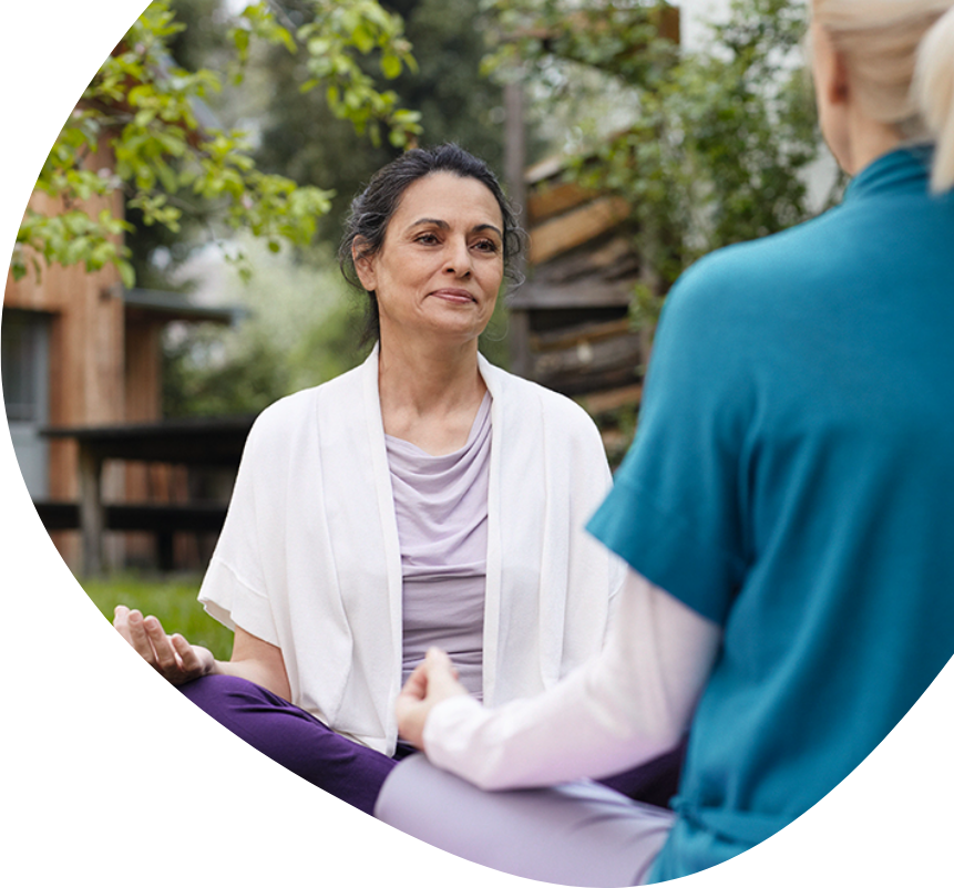 Two women meditating